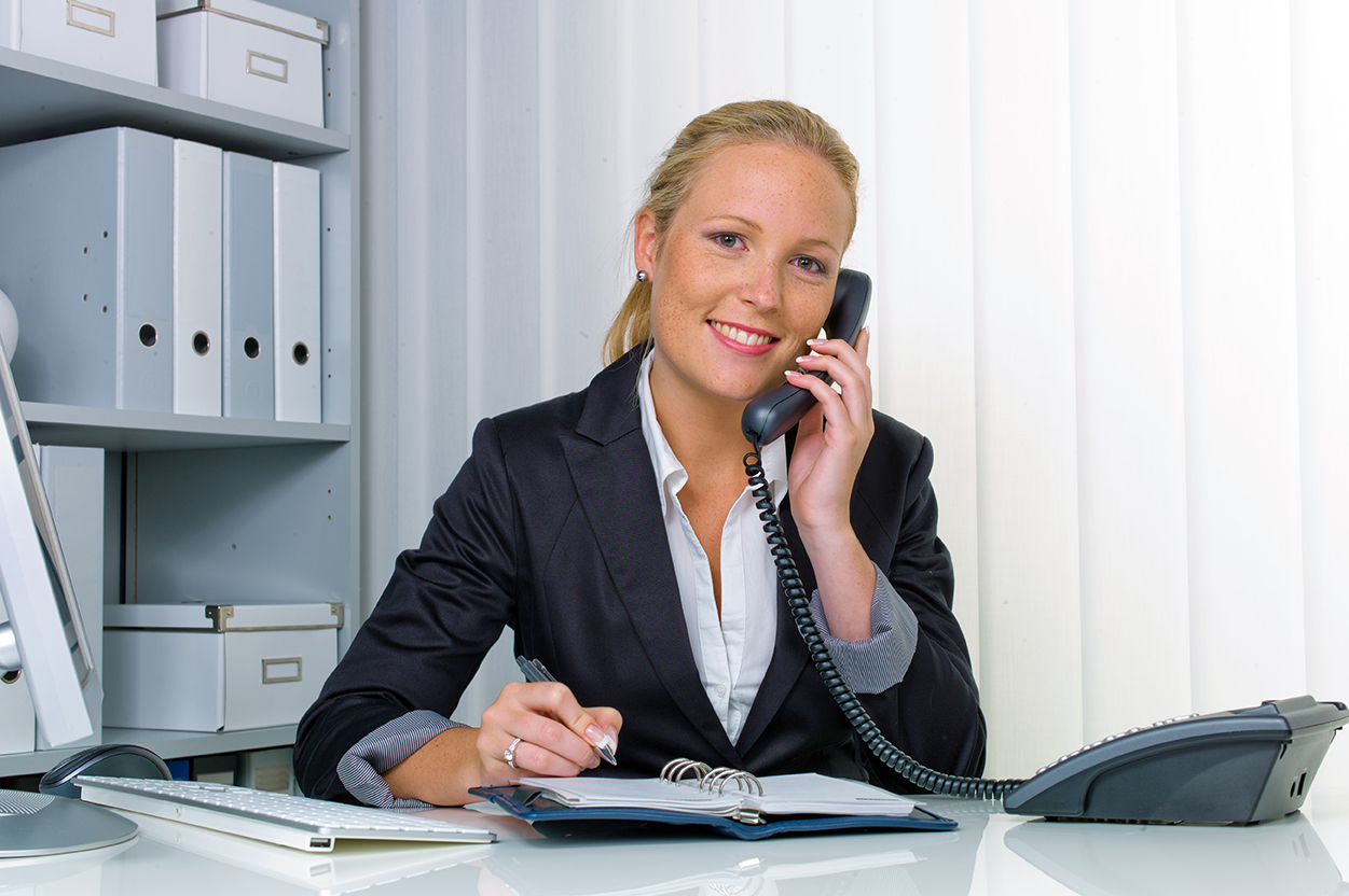 friendly Rockland County court clerk on phone a friendly Rockland County court clerk telephoned at her desk in the court office and recorded events in the calendar
