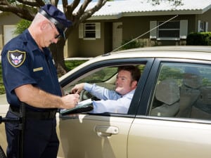 officer giving traffic ticket to driver in Rockland County
